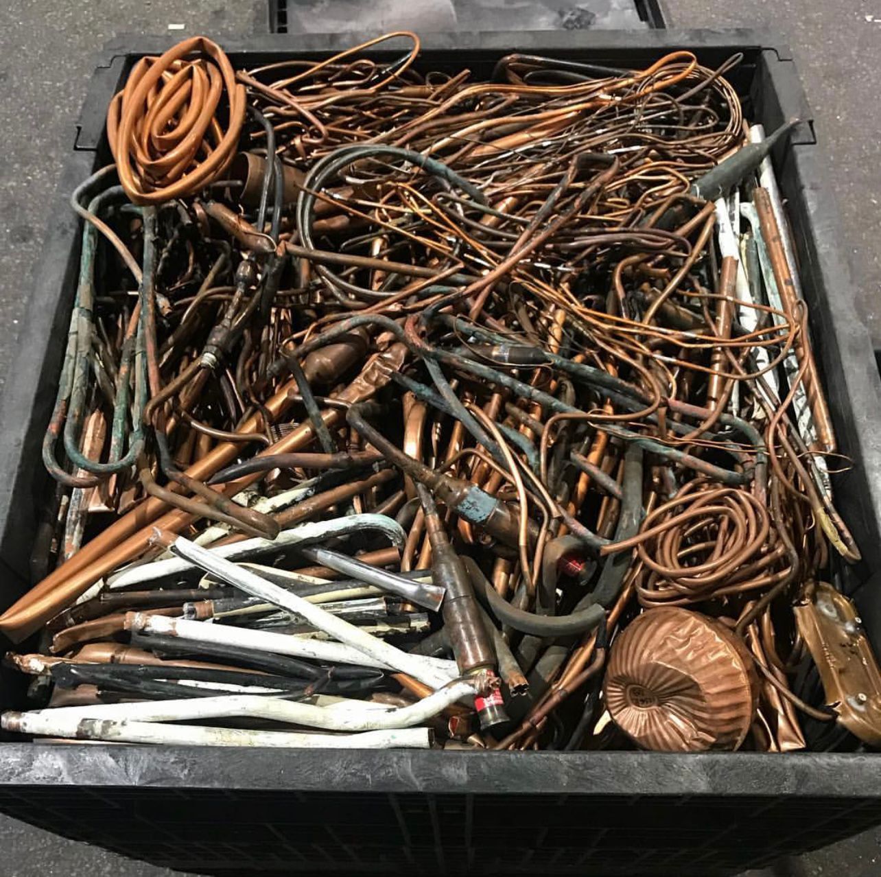 Collected copper pipes and fittings ready for recycling and metal recovery in Singapore.