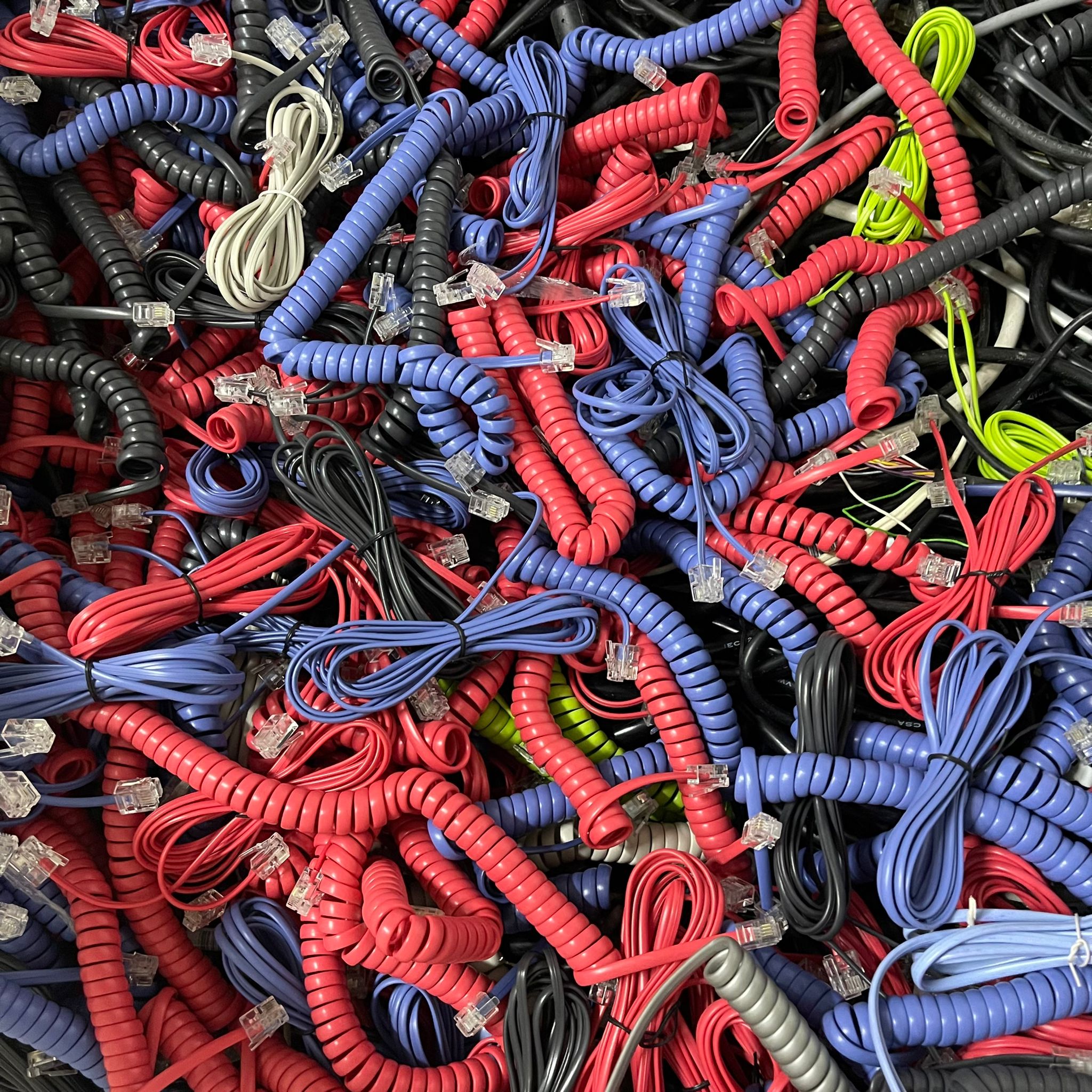 Mixed Telephone Copper Wire Recycling Singapore Mixed telephone copper wires in various colours collected for recycling in Singapore.