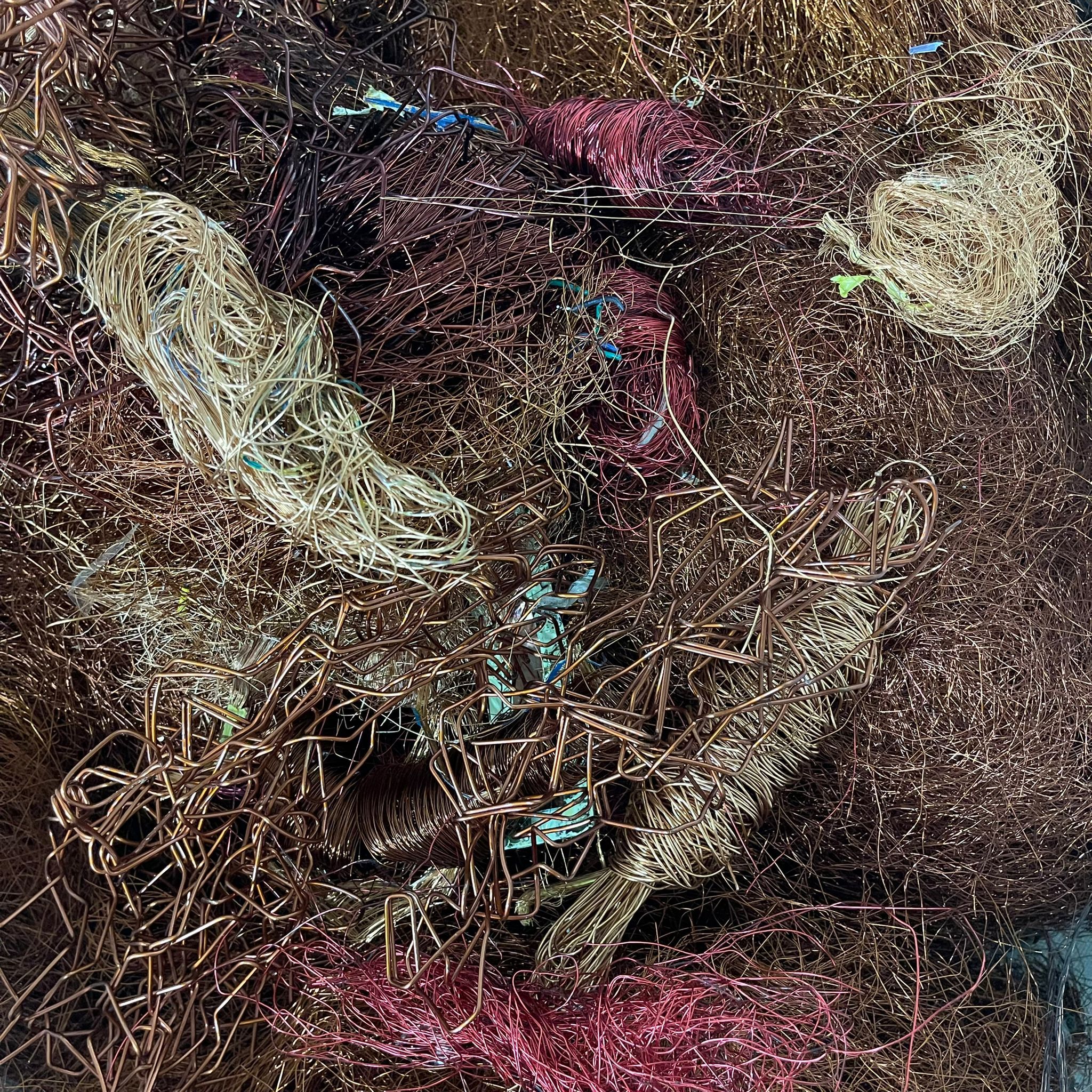 Recovered transformer and motor copper wires prepared for recycling and metal recovery in Singapore.